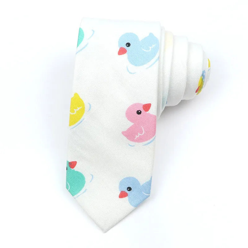 Korean style narrow men's cotton bow tie with a printed cartoon pattern on an adjustable fabric strap.