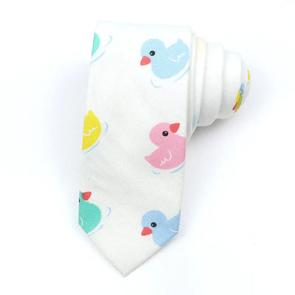 Korean style narrow men's cotton bow tie with a printed cartoon pattern on an adjustable fabric strap.