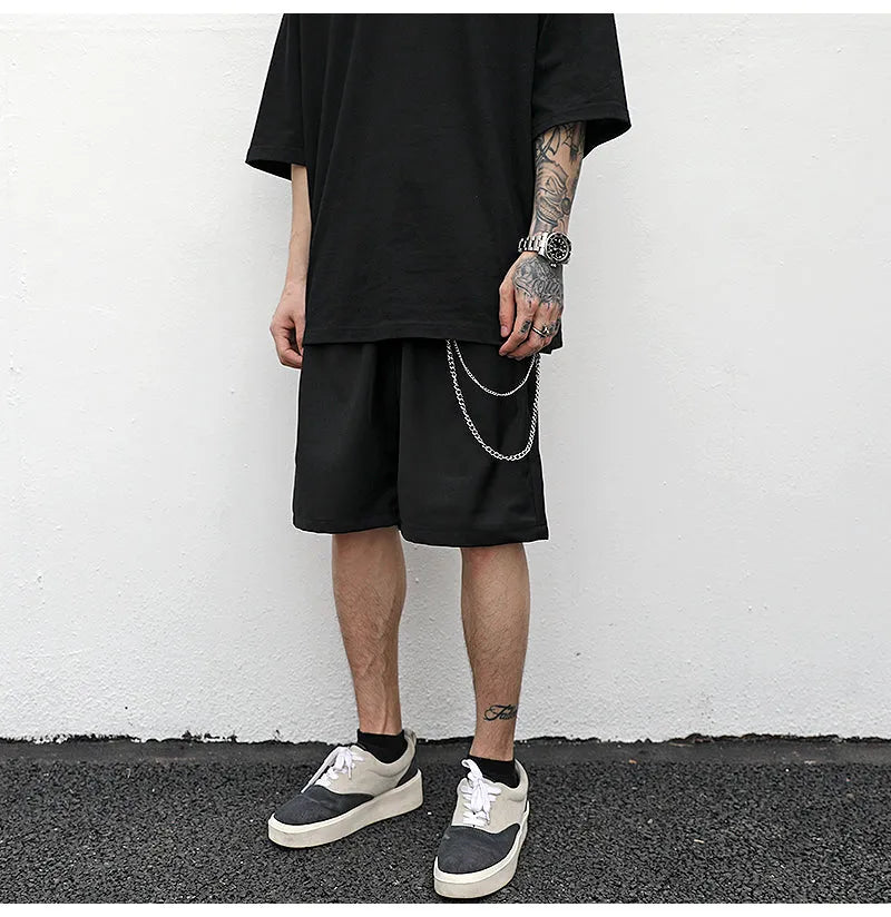 Black cotton trouser chain suit shorts with chain detail, available in sizes S M L XL