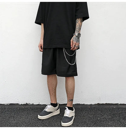 Black cotton trouser chain suit shorts with chain detail, available in sizes S M L XL