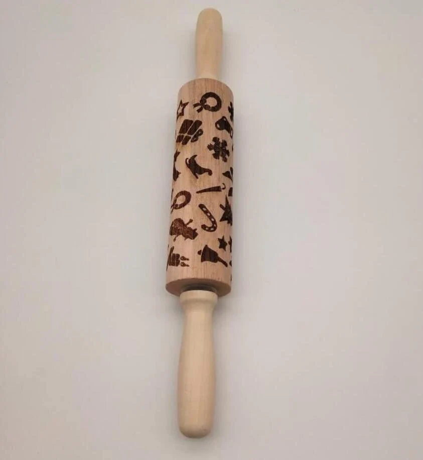 Festive rolling pin with embossed Christmas designs for easy imprinting on dough