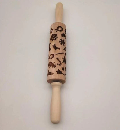 Festive rolling pin with embossed Christmas designs for easy imprinting on dough