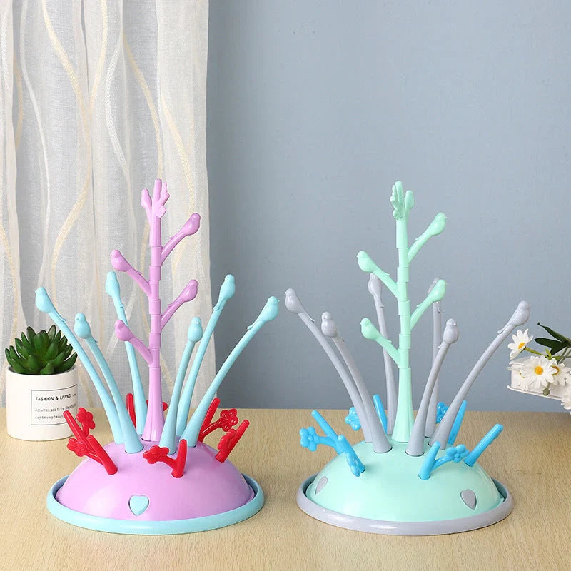 Portable baby bottle drying rack in green and purple, made from safety PP material