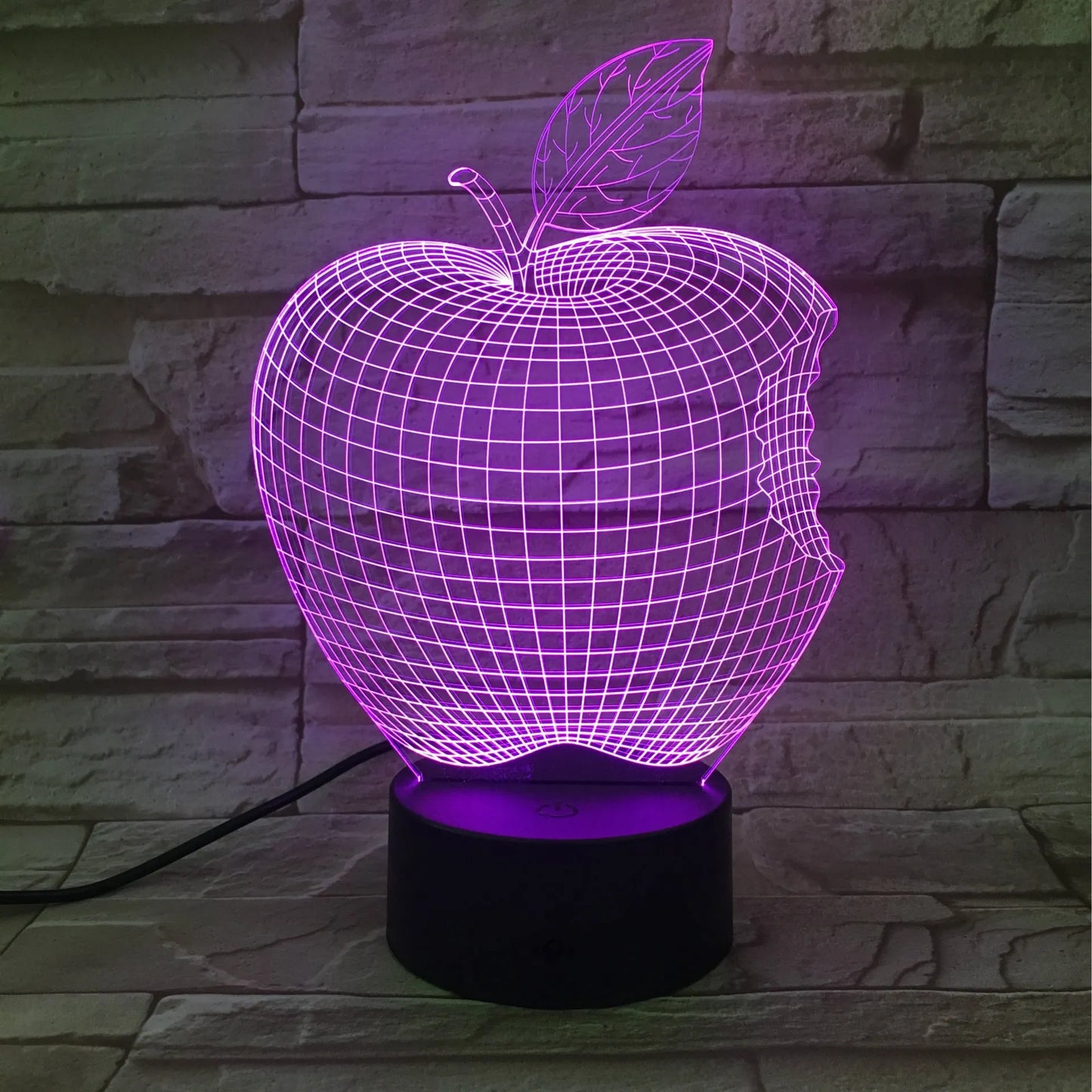 Colourful 3D fruit design LED night light with touch control on a table.