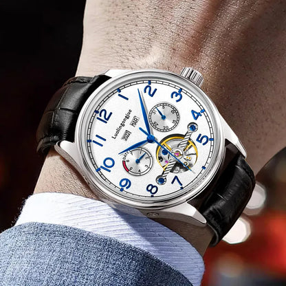 Men's stainless steel mechanical watch with sapphire crystal glass and leather strap showing transparent caseback