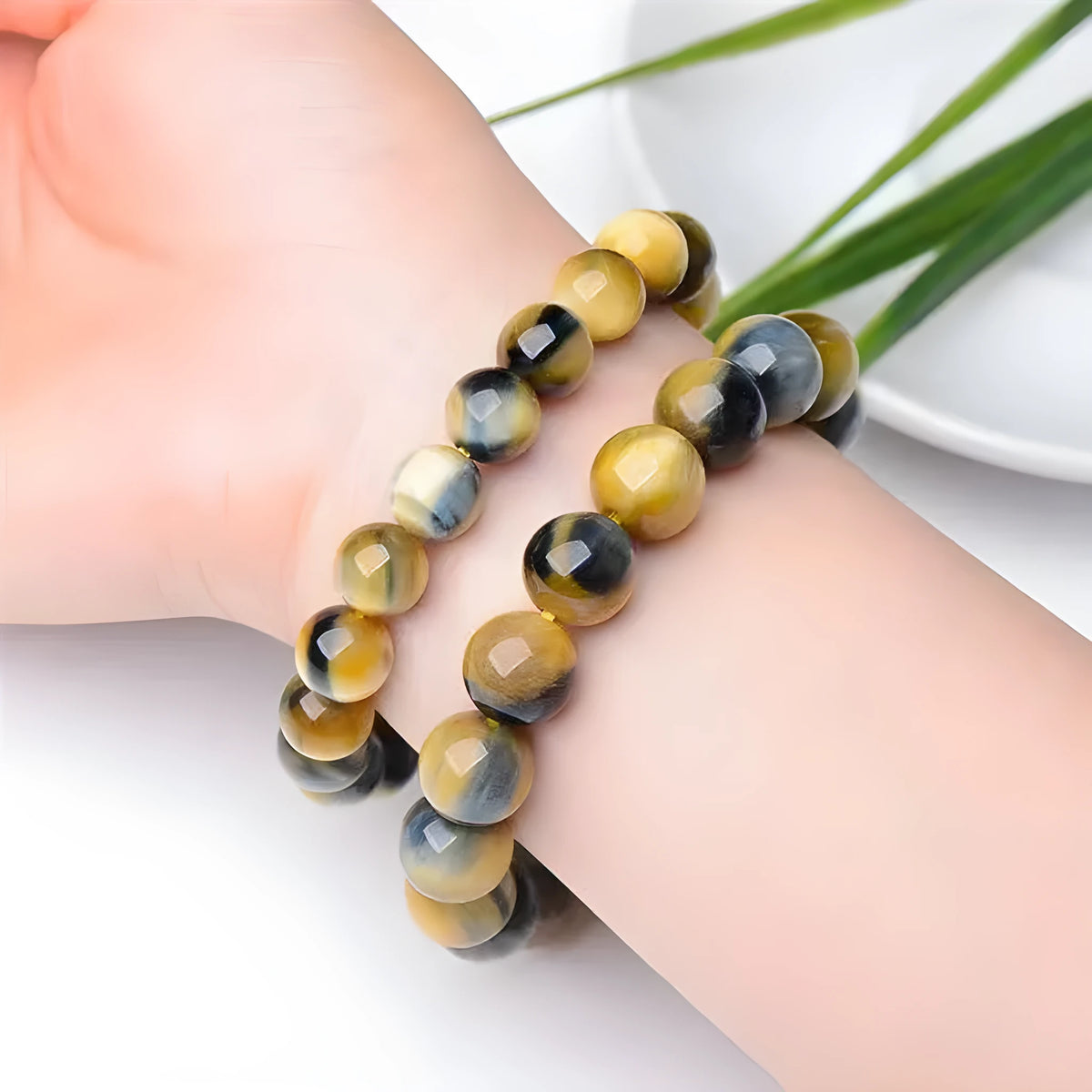 Fantasy tiger eye agate unisex bracelet with round beads in geometric single-circle design.