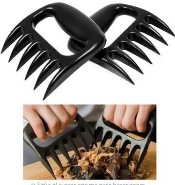 Two black bear claw meat shredding forks with non-slip grips for barbecue preparation