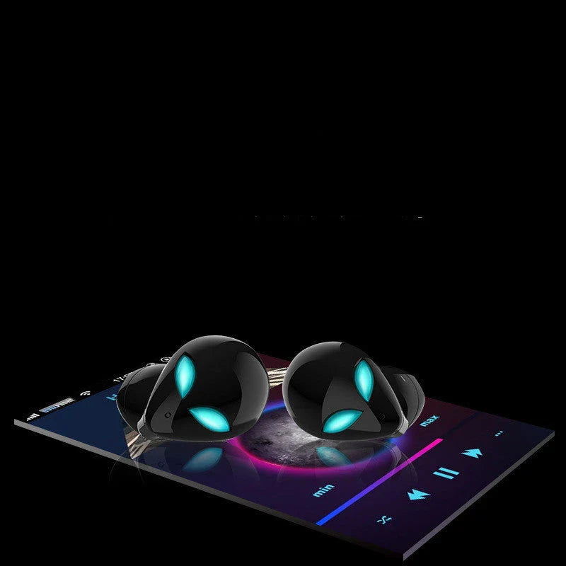 Creative Outer T8 Starman Bluetooth Headset with alien-inspired design, vibrant LED lights, and wireless charging capabilities