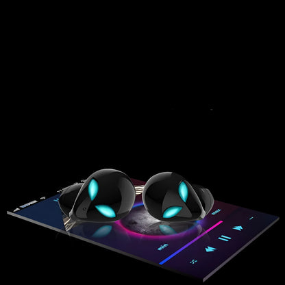 Creative Outer Starman T8 alien-design wireless Bluetooth earbuds and charging case in black.