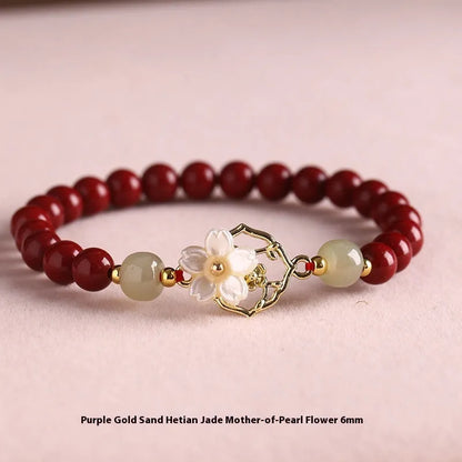 Handcrafted cinnabar bracelet with Hetian jade elements and lotus motifs in New Chinese style showing purple gold sand and emperor sandstone colour options