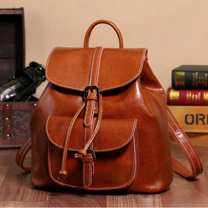 Korean style cowhide leather backpack in black with front sandwich pockets and internal organisation compartments
