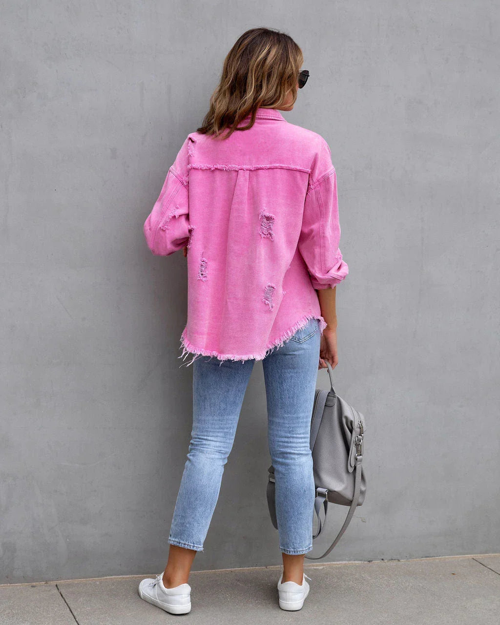 Stylish ripped denim jacket for trendy women in a variety of vibrant colors