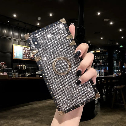 Square TPU mobile phone case in silver colour with a visible flash diamond bracket on the back