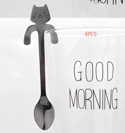 Stainless steel coffee spoon with cartoon cat handle showing hanging hole and smooth edges