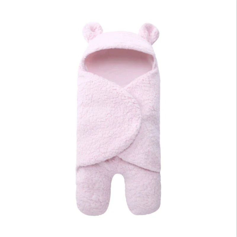 Cozy cotton baby sleeping bag with soft, breathable interior and warm, insulating outer layer