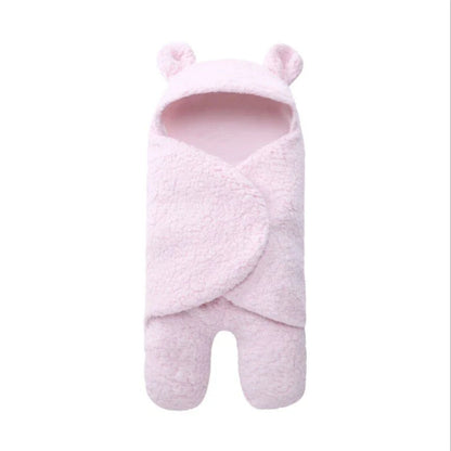Cozy cotton baby sleeping bag with soft, breathable interior and warm, insulating outer layer