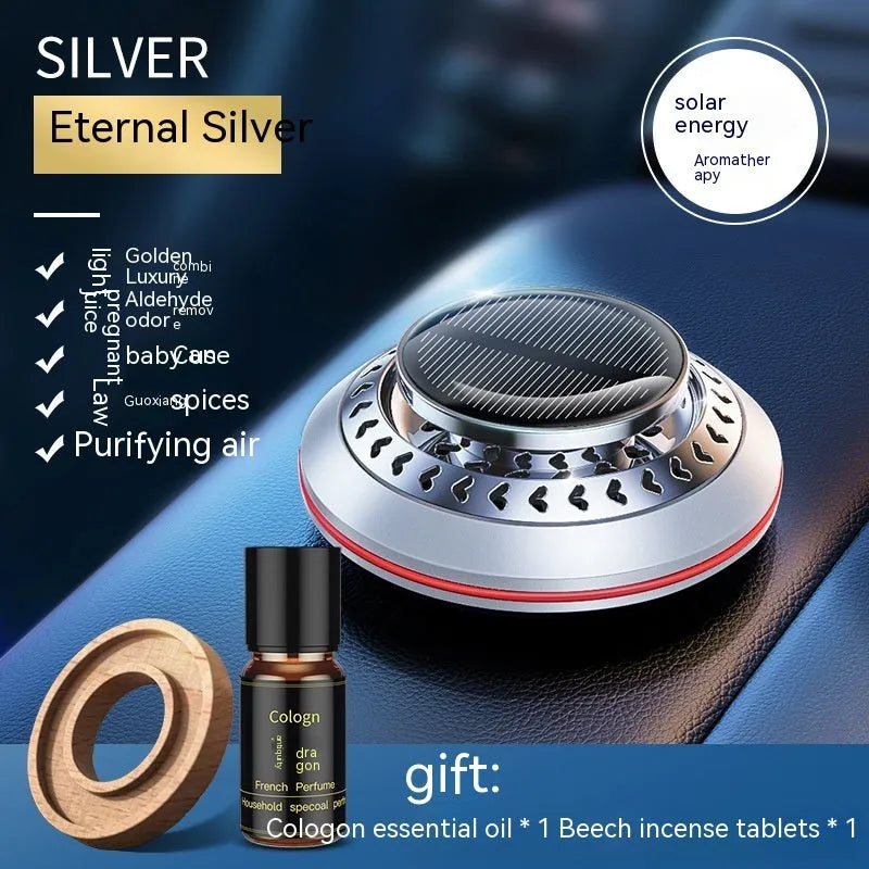Solar-powered aluminium car air purifier with essential oil bottle and beech wood chips for odour removal.