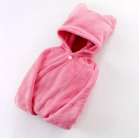 Blue hooded baby bath towel with dimensions 65cm by 110cm laid flat.