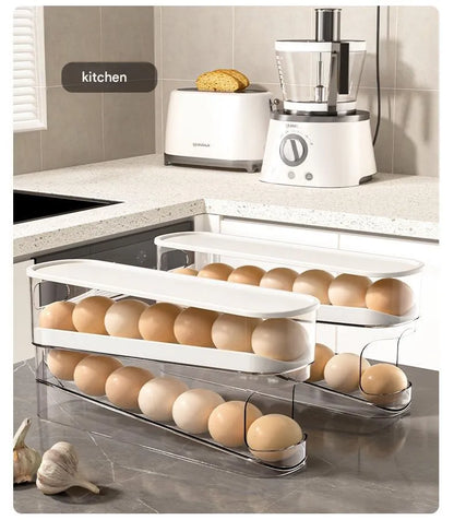 White plastic refrigerator slide-out egg dispenser tray mounted on refrigerator door
