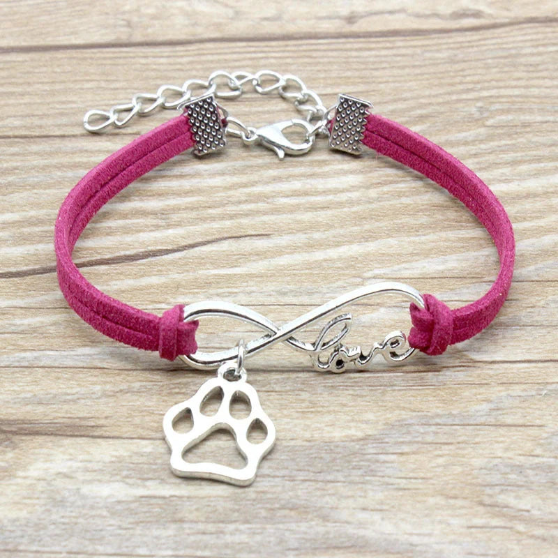 Stylish hand-woven infinite love pet bracelet in various colours, featuring a bow design and made of premium alloy materials