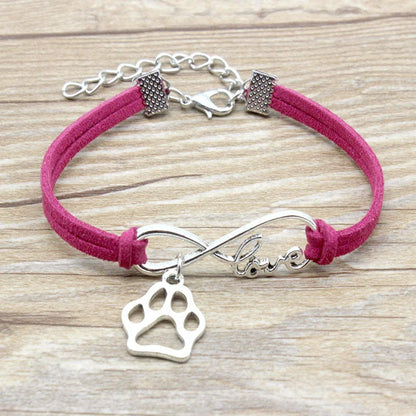 Stylish hand-woven infinite love pet bracelet in various colours, featuring a bow design and made of premium alloy materials