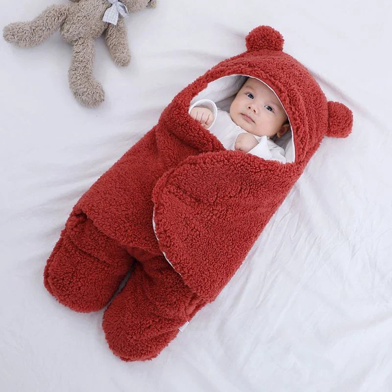 Cozy cotton baby sleeping bag with soft, breathable interior and warm, insulating outer layer