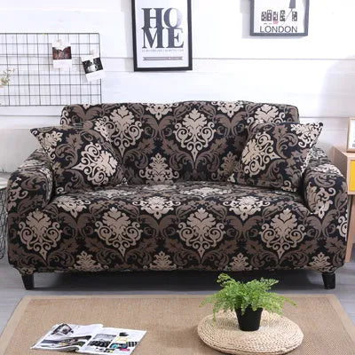 Printed stretchable sofa slipcover with geometric abstraction pattern on a three-seater sofa, showing tight fit and modern design.