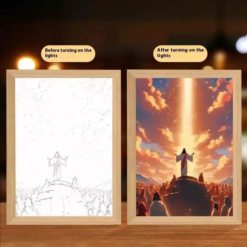 Modern rectangular light painting photo frame displaying an illuminated cross and scenic artwork.