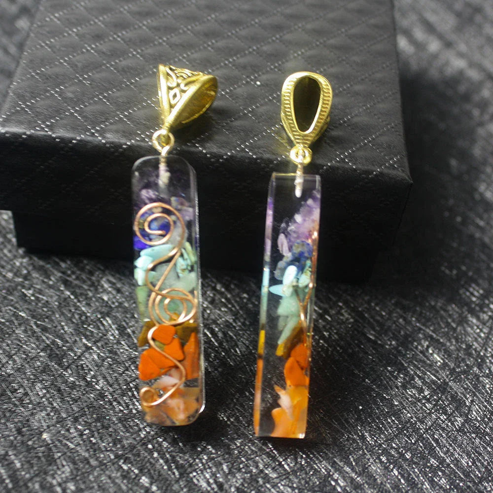 Handcrafted natural crystal seven chakra pendant with unique geometric design