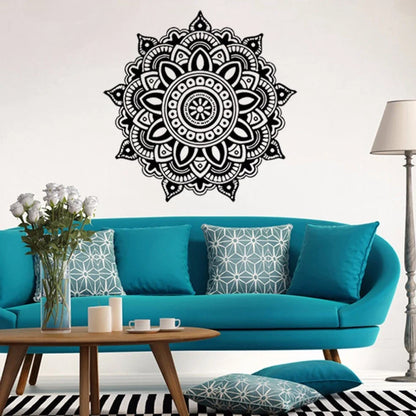 Black square wall sticker measuring 57cm by 57cm with geometric pattern on white wall