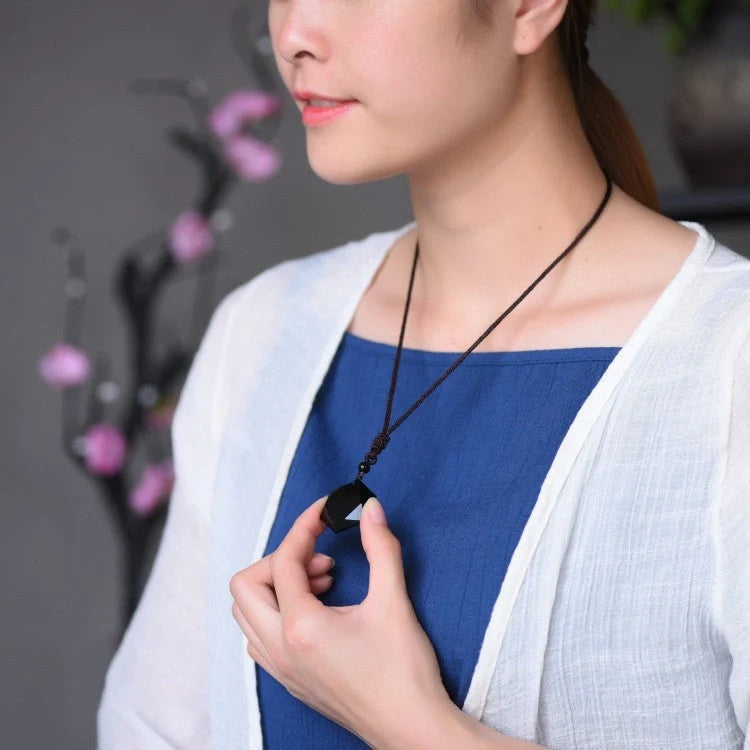 Handcrafted obsidian six-pointed star sweater chain, a unique fashion accessory