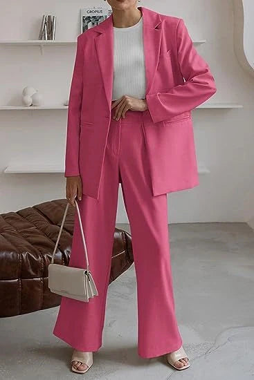 Tailored ladies' suit in various colours, featuring a jacket and trousers made of premium polyester fabric.
