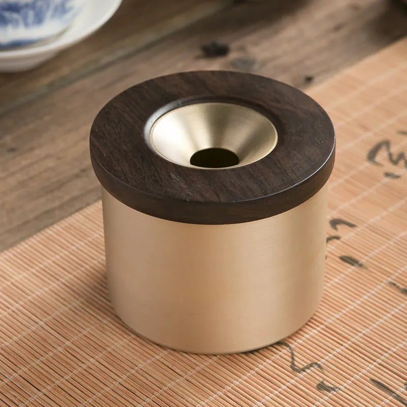 Retro brass ashtray with wooden lid on copper base, showing 12cm diameter and central hole