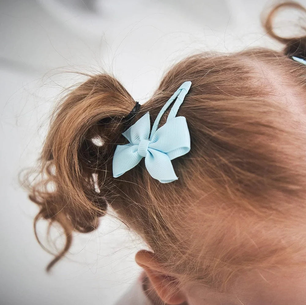 40 assorted colour snap hair bow clips with grosgrain ribbon bows measuring 2 inches wide