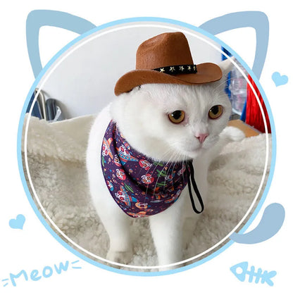 A small black cowboy hat with white stars on a non-slip surface, showing its adjustable strap.
