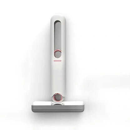 Portable self-squeezing mini mop with biodegradable cotton head and 180-degree folding mechanism