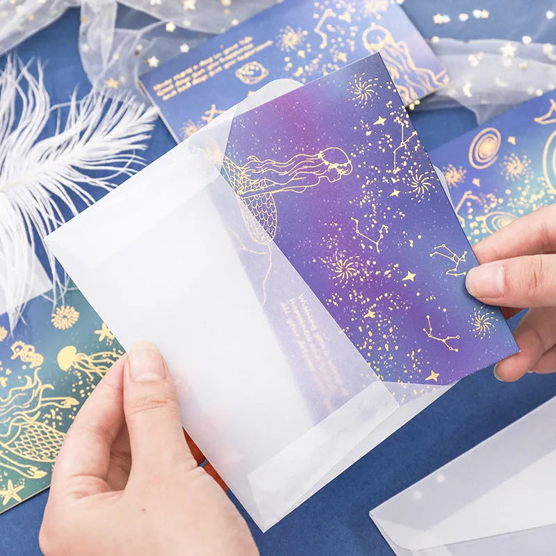 Set of three bronzed sulfuric acid paper greeting card envelopes in one of four colour designs.