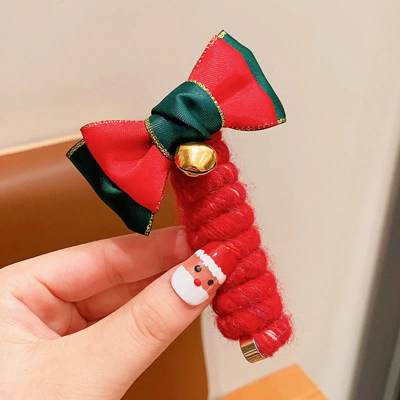 Festive Christmas-themed hair ties with cute designs like bells, trees, and reindeer for kids