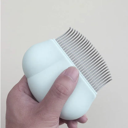 Paw Soft deshedding brush in blue, pink, or white with a 9cm square head of stainless steel pins.