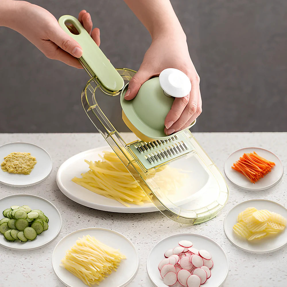 Shredded vegetable slicer with stainless steel blades on green cutting board