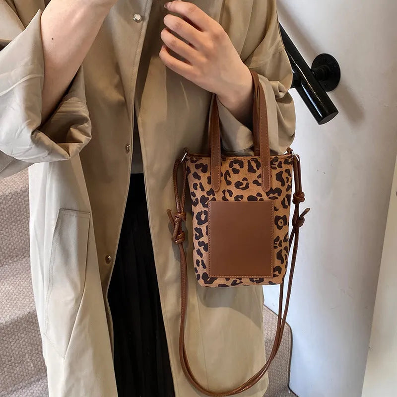 Women's retro leopard print crossbody bag with 166cm strap, square vertical PU shoulder bag in khaki or brown