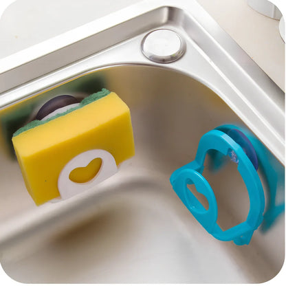 Plastic hook sponge storage rack with suction cups in pink, blue, green, white colours