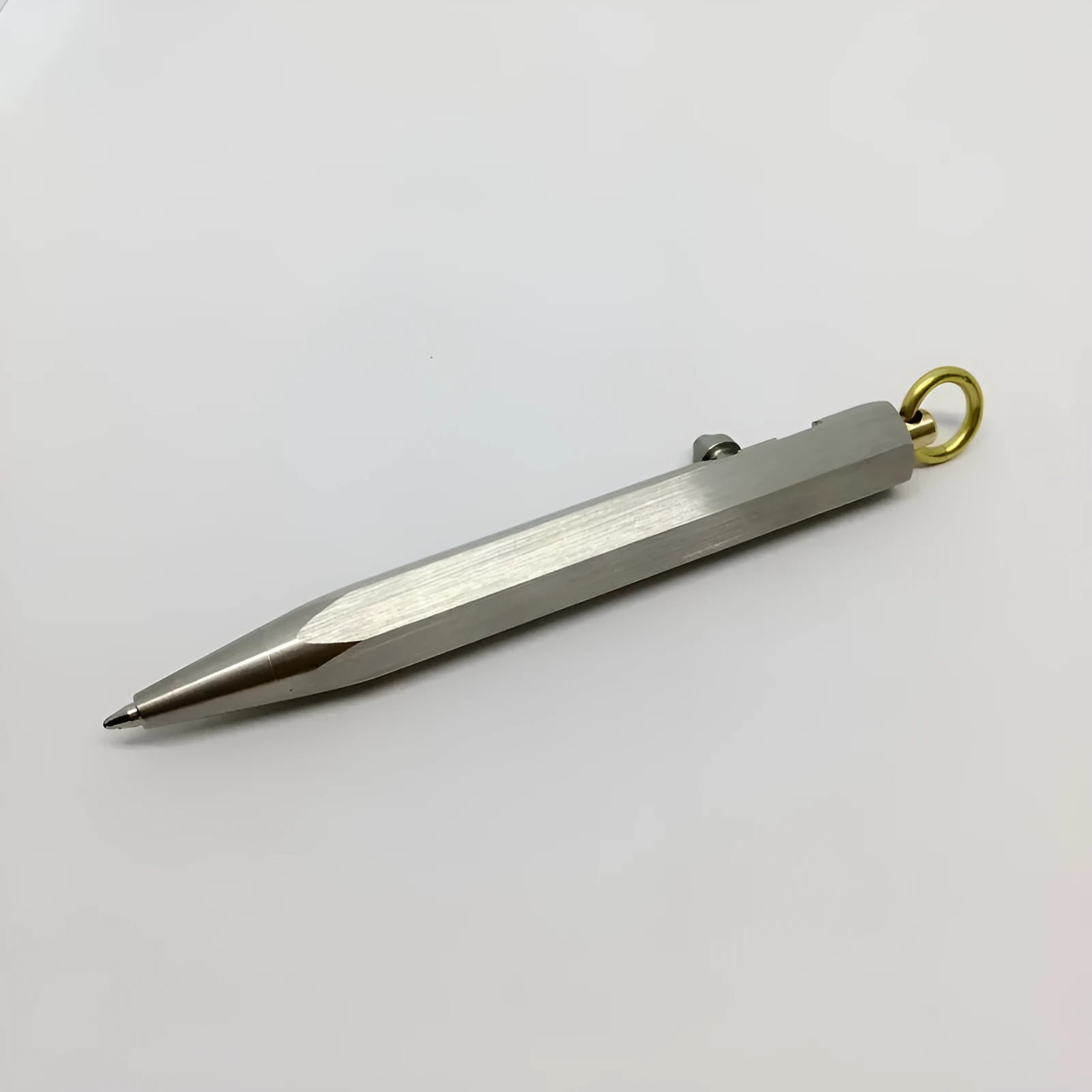 Six-sided stainless steel brass keychain push pen with metal shell and keychain attachment