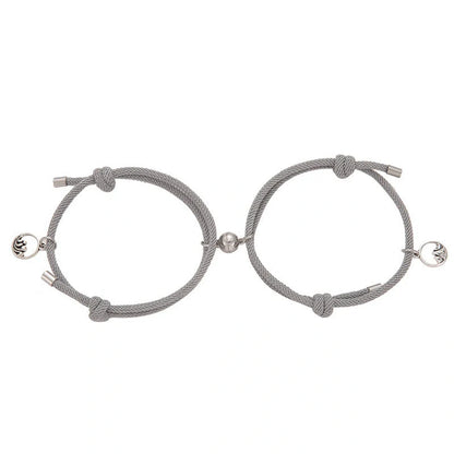 Magnetic couple's bracelet with geometric design and meaningful charms inspired by ancient Chinese tradition