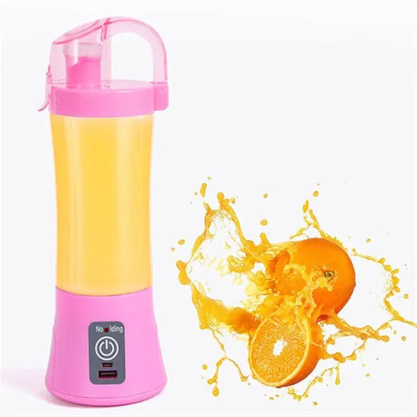 Blue handheld electric fruit juicer with USB port, 400ml cup, and blending blades on a kitchen counter