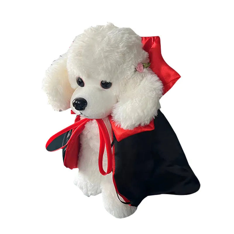 Red Halloween bat costume cloak and pointed hat on a small dog