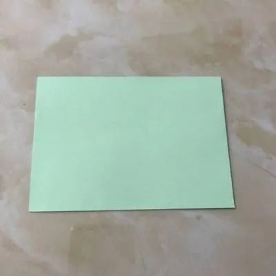 Mini coloured paper envelopes in various hues measuring 11.5 by 8 centimetres