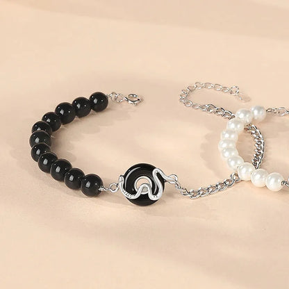 A New Chinese style 925 sterling silver couple's bracelet with snake zodiac detailing and a safe buckle clasp.