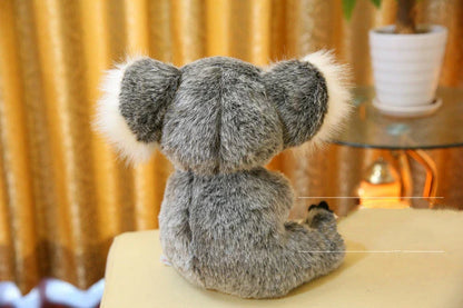 A soft, cuddly koala plush toy with short, premium plush fur and 100% pure cotton filling, showcasing the high-quality British craftsmanship.