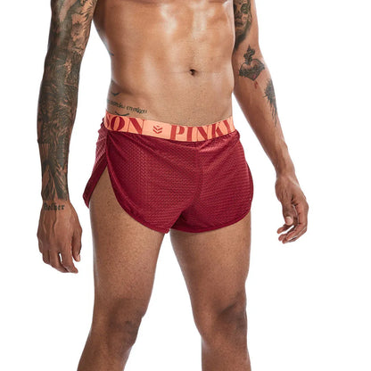 Men's solid colour breathable mesh boxer briefs on a mid waist, showing the fabric texture.